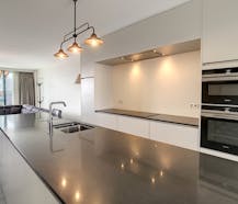 Luxe penthouse met twee terrassen en zicht op het Handelsdok