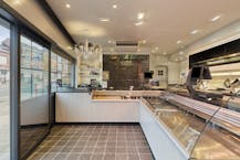 Handelspand met woonst te koop in Kortrijk