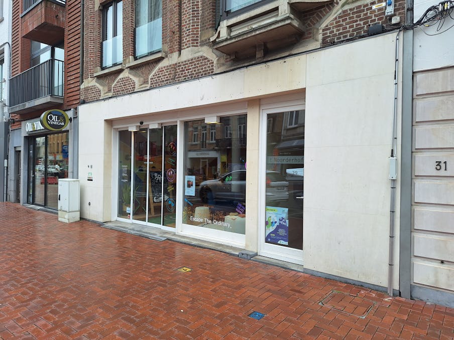 Handelspand met garages te koop in centrum Roeselare