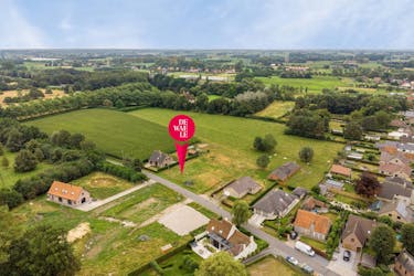 Bouwgrond (1.297m²) te koop voor halfopen bebouwing te Sijsele (Damme)