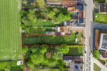 Ruim stuk bouwgrond te koop nabij centrum Sint-Baafs-Vijve