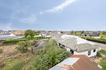 Twee aanpalende bouwgronden (nr. 55 & 57) – samen 933 m²