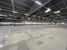 Magazijn (8.814 m² ) te huur bij afrit E17 te Zele