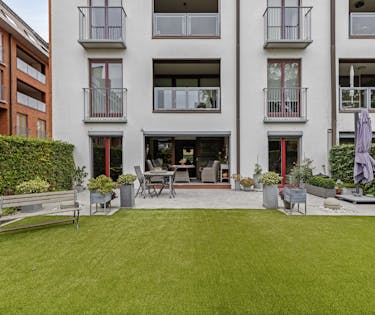 Appartement met tuin en garage in Kortrijk centrum