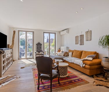 Gerenoveerd duplex appartement te Brugge met zonnig terras