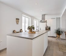 Gerenoveerd duplex appartement te Brugge met zonnig terras