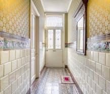 Karaktervol huis met zonnige tuin, 3 slaapkamers én garage met uitweg