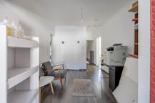 Handelspand met woning in Genk