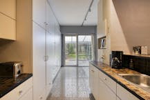 Ruim huis te koop Merksem met garage en zonnige tuin