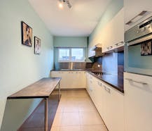 Gelijkvloers appartement met 2 slaapkamers en garagebox!