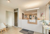 Opbrengsteigendom met kantoor en appartement