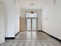 Woning met 4 slaapkamers en zonnige stadskoer te Roeselare