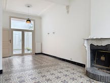 Woning met 4 slaapkamers en zonnige stadskoer te Roeselare