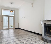 Woning met 4 slaapkamers en zonnige stadskoer te Roeselare