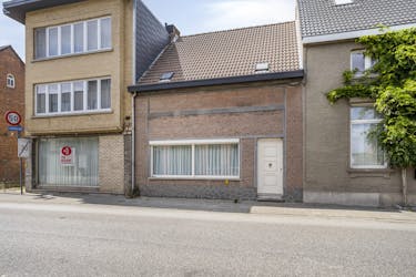 Te renoveren huis met vier slaapkamers en tuin in het centrum