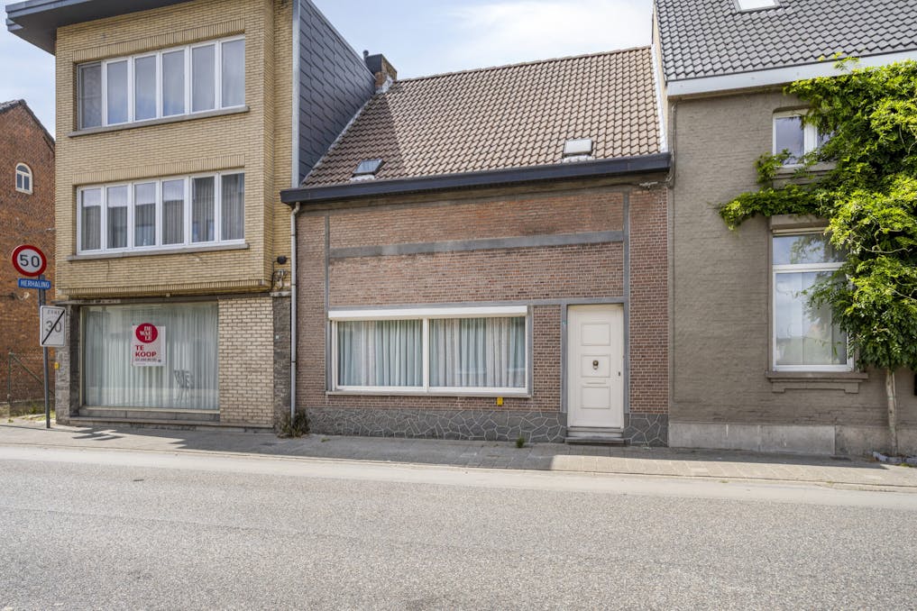 Te renoveren huis met vier slaapkamers en tuin in het centrum