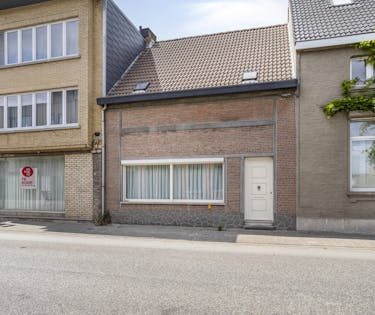 Te renoveren huis met vier slaapkamers en tuin in het centrum