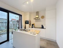 Recent appartement met 1 slaapkamer te huur aan de Leie in Kortrijk