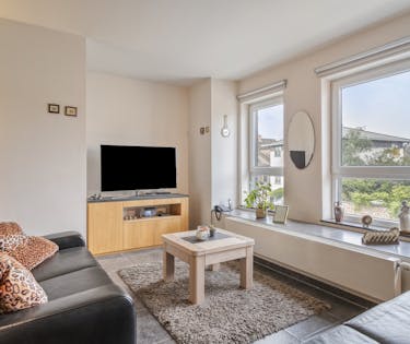 Instapklaar 2-slaapkamerappartement in centrum Merelbeke