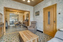 Halfopen huis te koop in Kortrijk met atelier of ruime garage