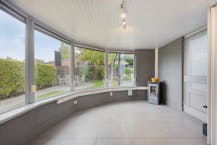 Woning (221 m²) met magazijn (150 m²) te koop in Zomergem