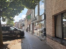 Handelspand met woonst te koop in centrum Brecht!
