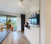 Appartement met drie slaapkamers en zicht op de Schelde.