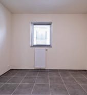  Gelijkvloers appartement met 2 slaapkamers en tuin te Westrozebeke