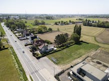 Lot bouwgrond (697 m²) + alleenstaande woning te koop Hulste