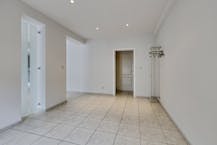 Opbrengsteigendom met 2 appartementen en hangaar te Lummen