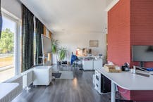 Handelspand met woning in Genk