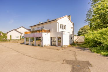 Handelspand met woning in Genk