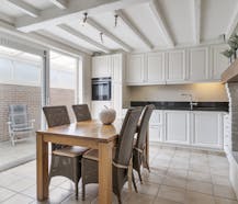 Handelspand met instapklare woning te Sint-Denijs