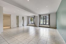 Opbrengsteigendom met 2 appartementen en hangaar te Lummen