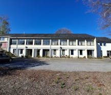 Patrimoniumvennootschap met handelsgelijkvloers en 9 gerenoveerde appartementen.