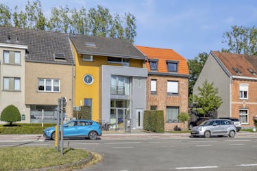 Handelspand met woonst: Ideale belegging te Baron Ruzettelaan