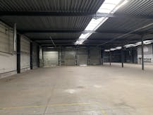 Bedrijfsgebouw te koop met zichtbaarheid vanop de Rijksweg.