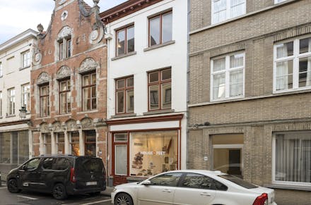 Handelspand met woonst te koop Brugge