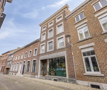 Uniek handelshuis met ruime garage in het hartje Borgloon