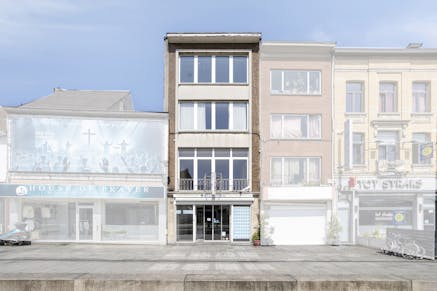 Handelspand met woonst te koop Merksem