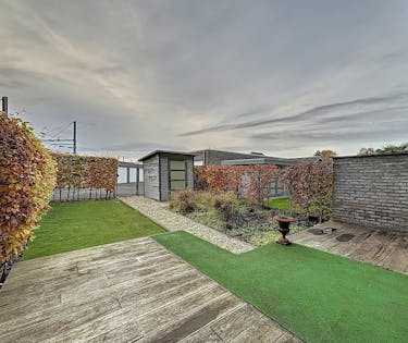 Gelijkvloers appartement met 2 slaapkamers en garagebox!