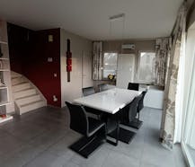 Halfopen woning te koop met zonnige tuin in Beringen