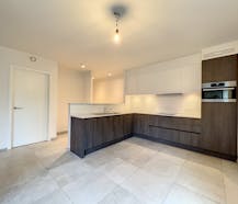 Appartement met twee slaapkamers en terras te huur.