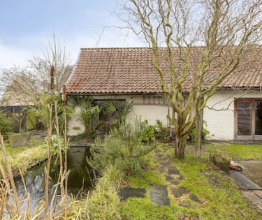 Charmante woning met afzonderlijk atelier/kantoor te koop