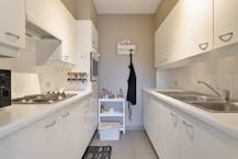 Gelijkvloers appartement met tuin en 2 slaapkamers te koop