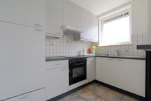 Appartement met 2 slaapkamers, ruim terras en oprit in Boom