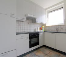 Appartement met 2 slaapkamers, ruim terras en oprit in Boom