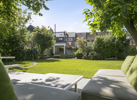 Polyvalent huis met uitzonderlijke tuin (742m²) te Brugge. 