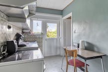 Te renoveren gezinswoning met leuke tuin in Geluwe