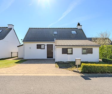 Vakantiewoning met drie slaapkamers en zongerichte tuin.